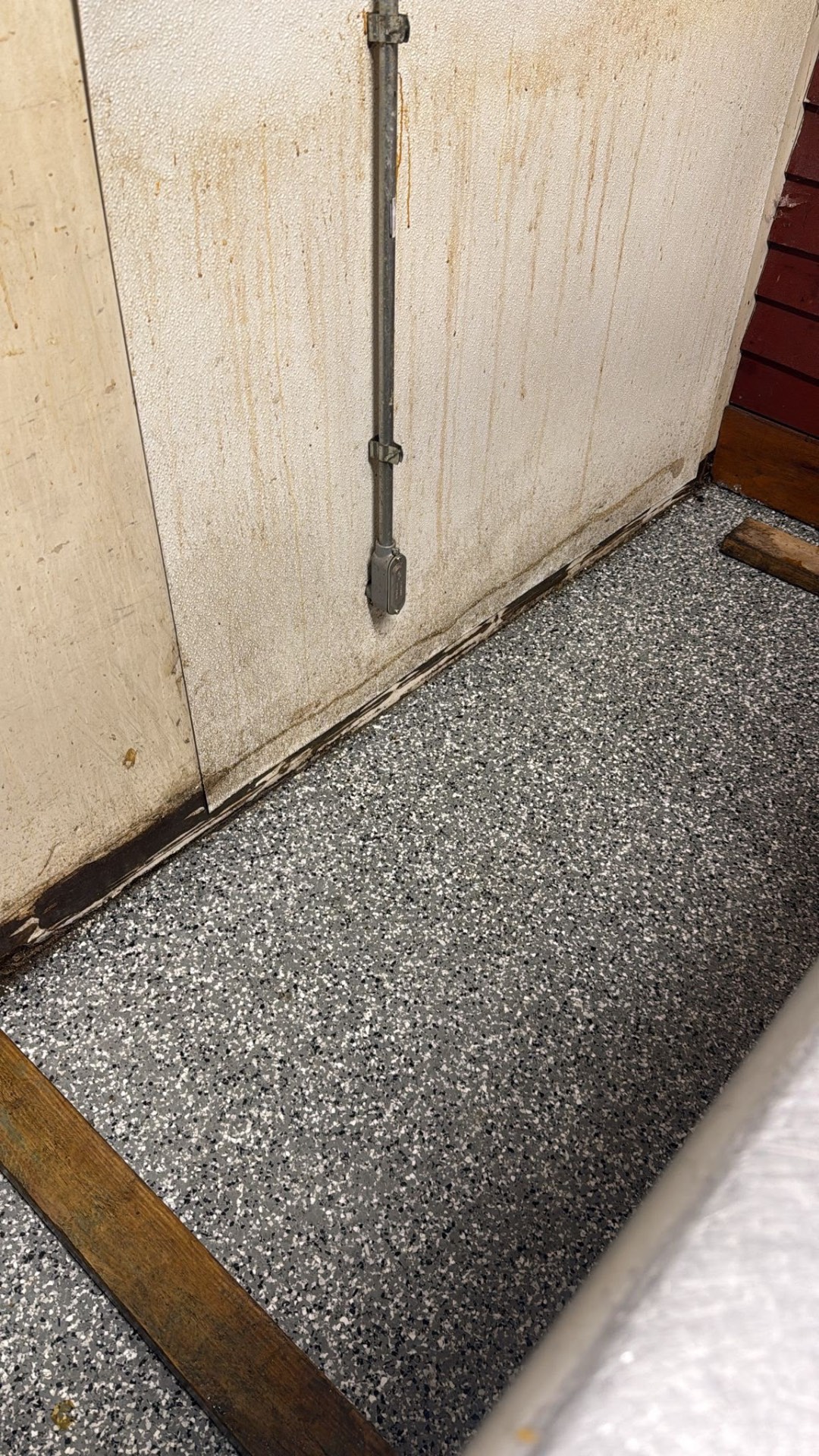 Same wall base and floor line after Clear Shine deep cleaning